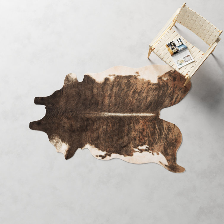 Beige and Brown Faux Cowhide Stain-Resistant Rug