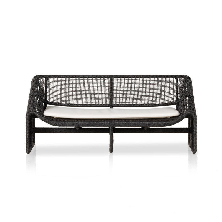 Curved Black Wicker Outdoor Sectional Sofa with White Cushions