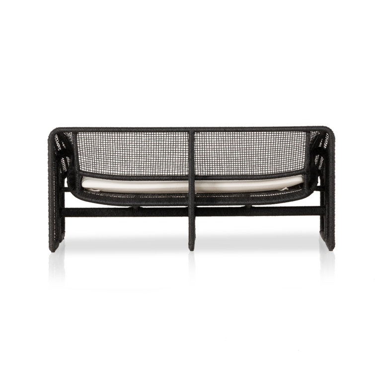 Curved Black Wicker Outdoor Sectional Sofa with White Cushions