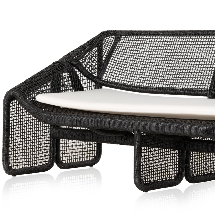 Curved Black Wicker Outdoor Sectional Sofa with White Cushions