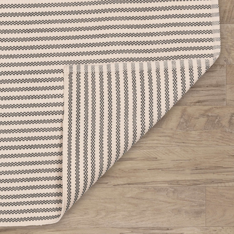 Brown and Ivory Striped Synthetic 6' x 9' Indoor/Outdoor Rug