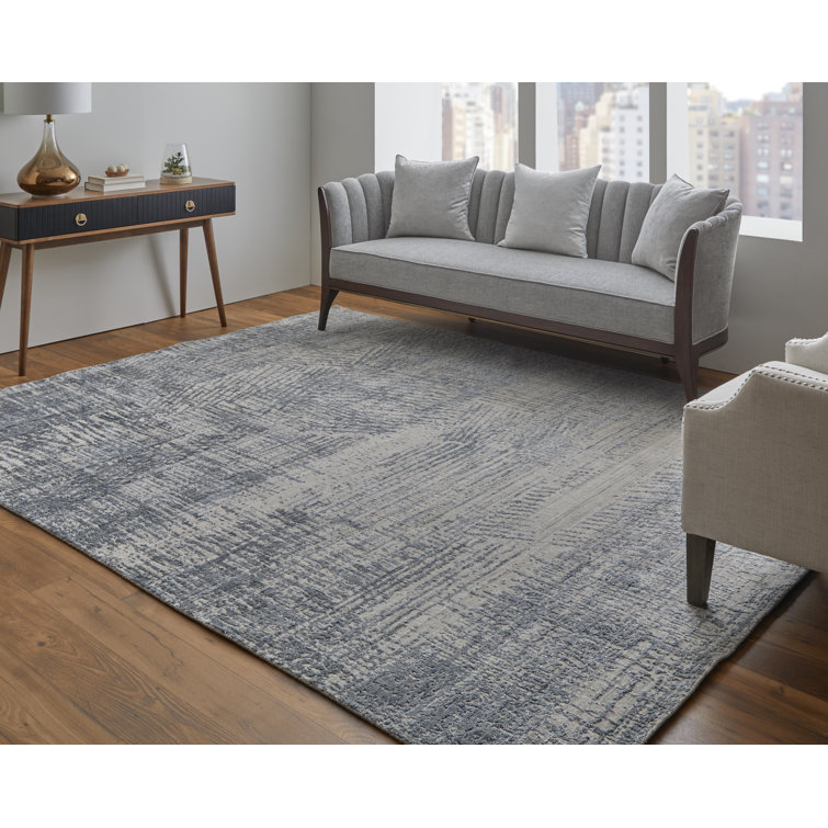 Handmade Blue and Ivory Wool Viscose Abstract Area Rug