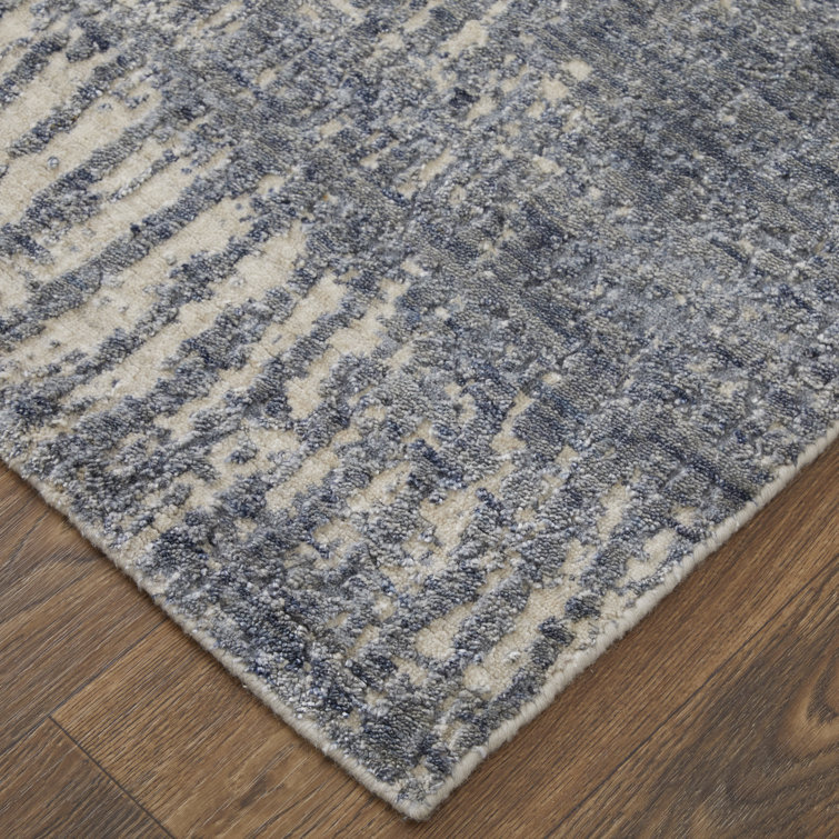 Handmade Blue and Ivory Wool Viscose Abstract Area Rug