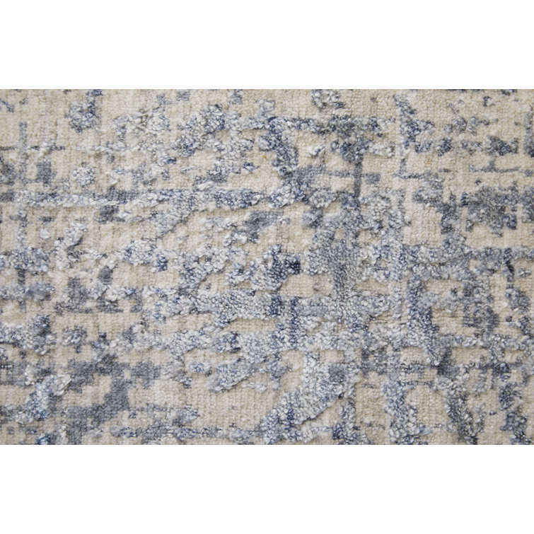 Handmade Blue and Ivory Wool Viscose Abstract Area Rug