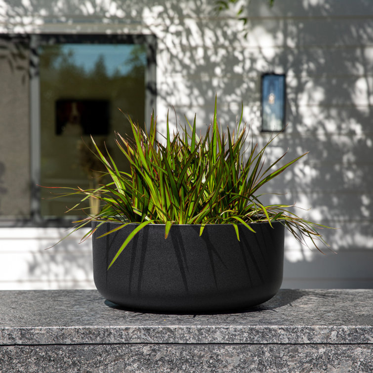 Black Round Plastic-Stone Composite Indoor/Outdoor Planter