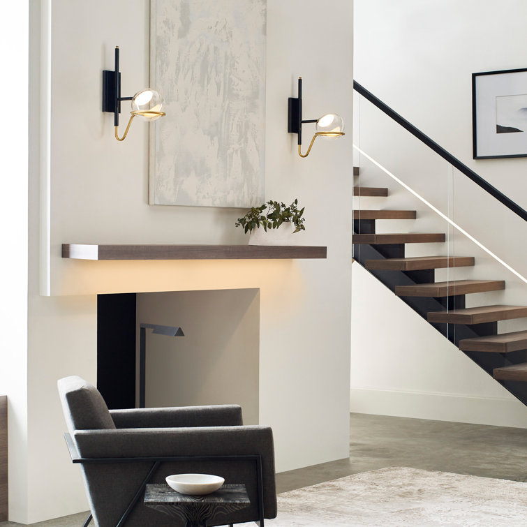 Crosby Medium Dimmable LED Wall Sconce in Glossy Black and Natural Brass