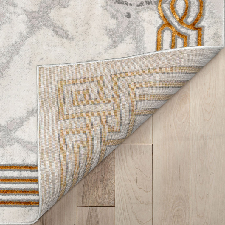 Ivory Abstract Easy-Care Stain-Resistant Synthetic Area Rug 5' x 7'