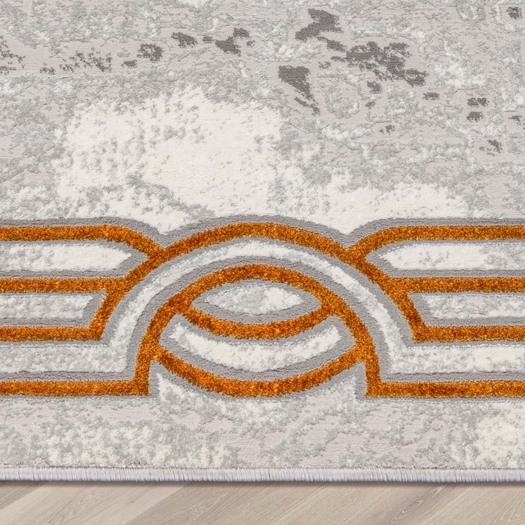 Ivory Abstract Easy-Care Stain-Resistant Synthetic Area Rug 5' x 7'