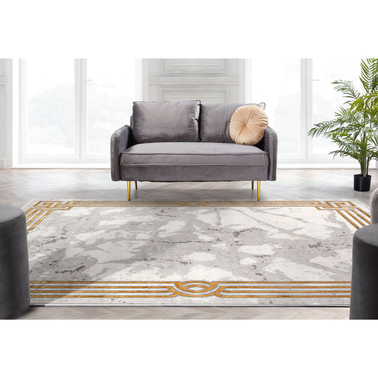 Ivory Abstract Easy-Care Stain-Resistant Synthetic Area Rug 5' x 7'
