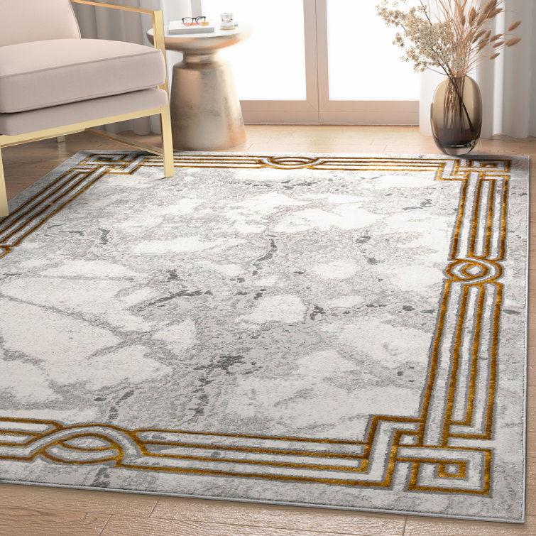 Ivory Abstract Easy-Care Stain-Resistant Synthetic Area Rug 5' x 7'