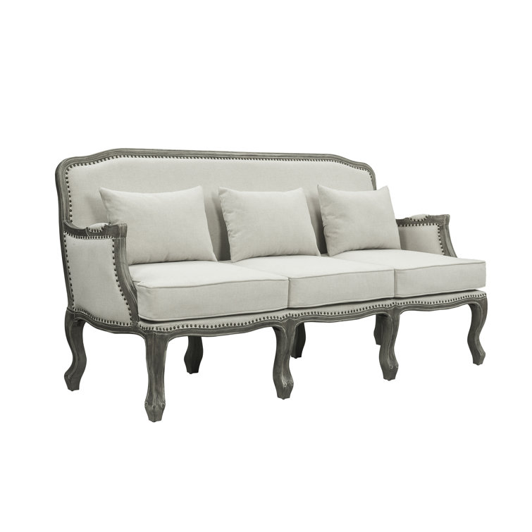 Tania Cream Linen Sofa with Nailhead Trim and Carved Wood Legs