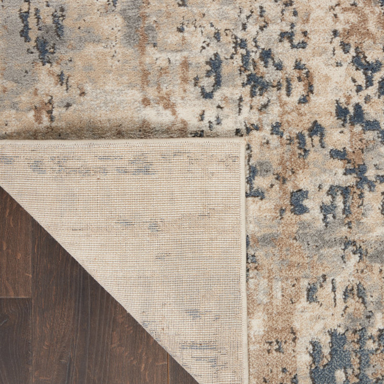 Gray and Beige Abstract 6' x 9' Synthetic Area Rug