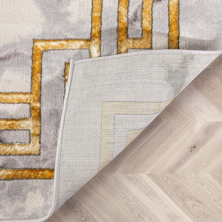 Ivory Abstract Easy-Care Stain-Resistant Synthetic Area Rug 5' x 7'