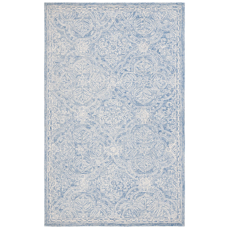 Etienne Blue and Ivory Floral Wool Tufted Rug