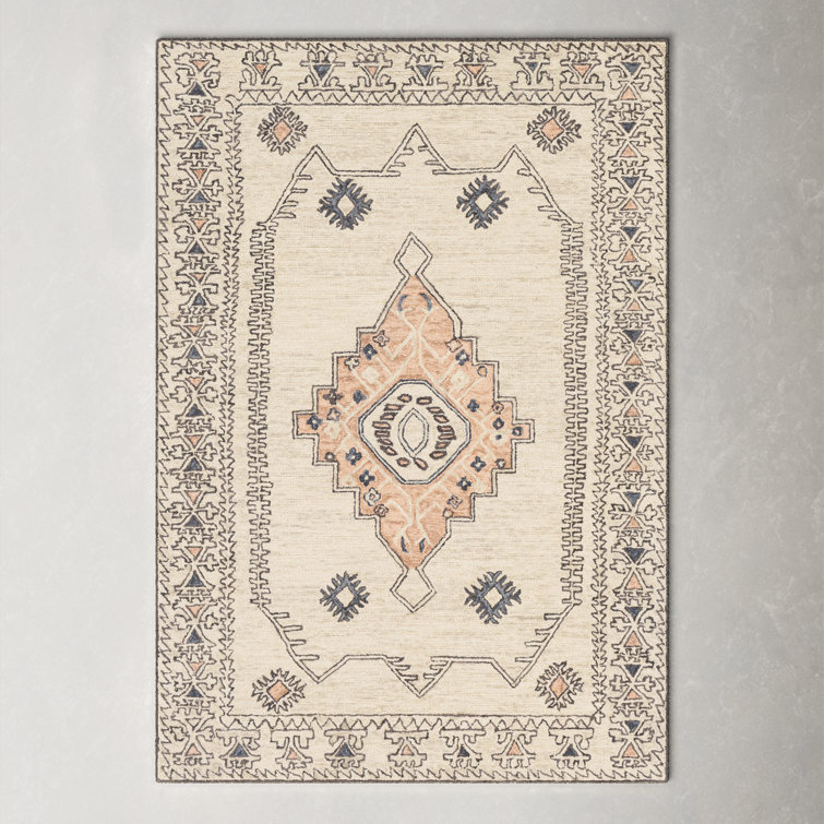 Ivory and Peach Hand Tufted Wool Area Rug 5' x 7'6"