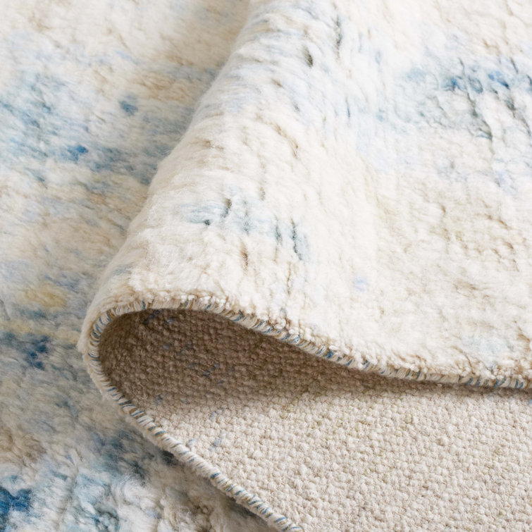 Hand-Knotted Blue and Ivory Wool 6' x 9' Area Rug