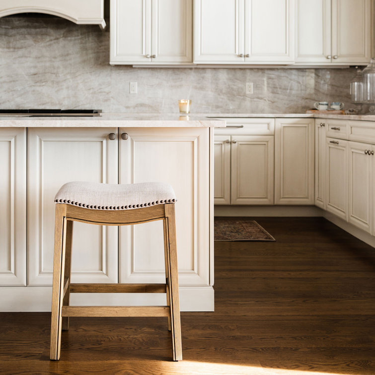 Adrien Brown Backless Saddle Wood Counter Stool