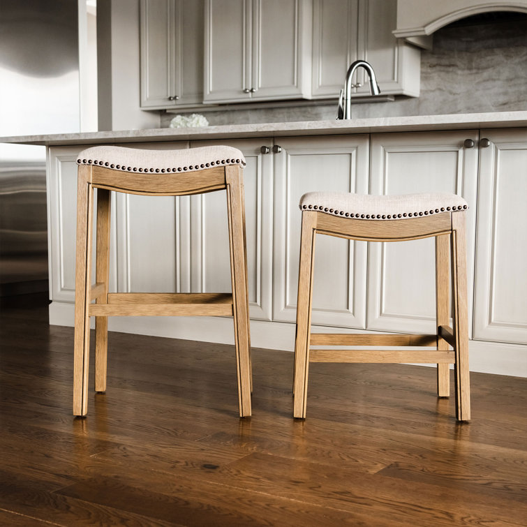 Adrien Brown Backless Saddle Wood Counter Stool