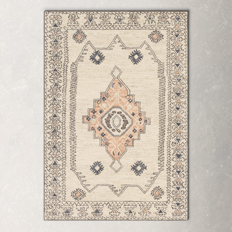 Ivory and Peach Hand Tufted Wool Area Rug 5' x 7'6"