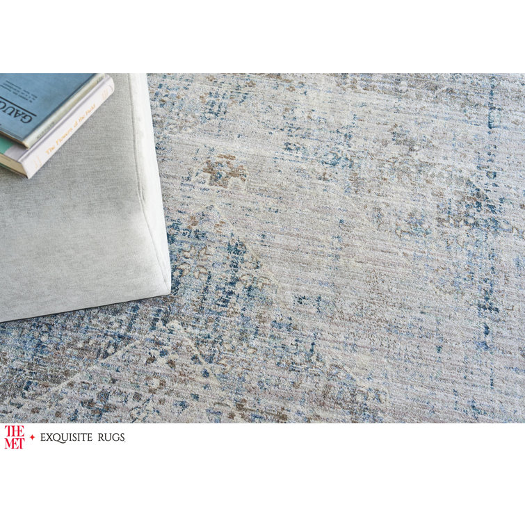 Vintage Blue and Beige 10' x 14' Synthetic Area Rug