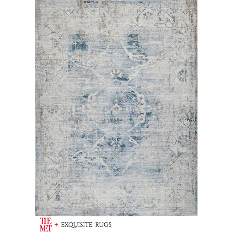 Vintage Inspired Light Blue and Beige 10' x 14' Synthetic Area Rug