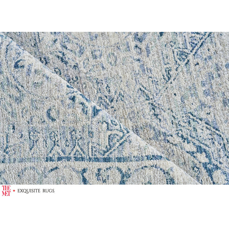 Vintage Blue Rectangular 10' x 14' Synthetic Area Rug
