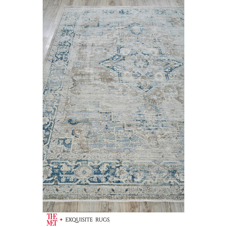 Vintage Blue and Beige 4' x 6' Synthetic Area Rug