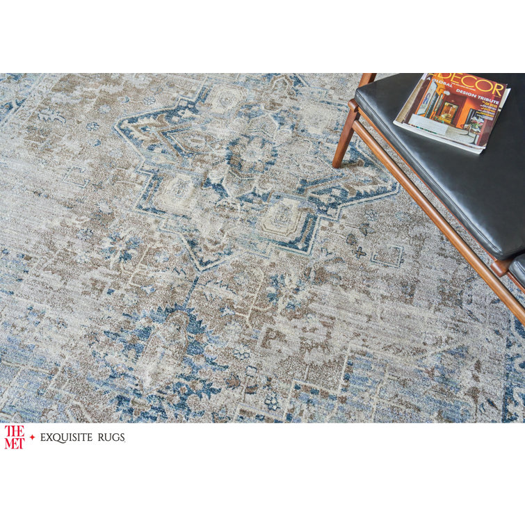 Vintage Blue and Beige 4' x 6' Synthetic Area Rug