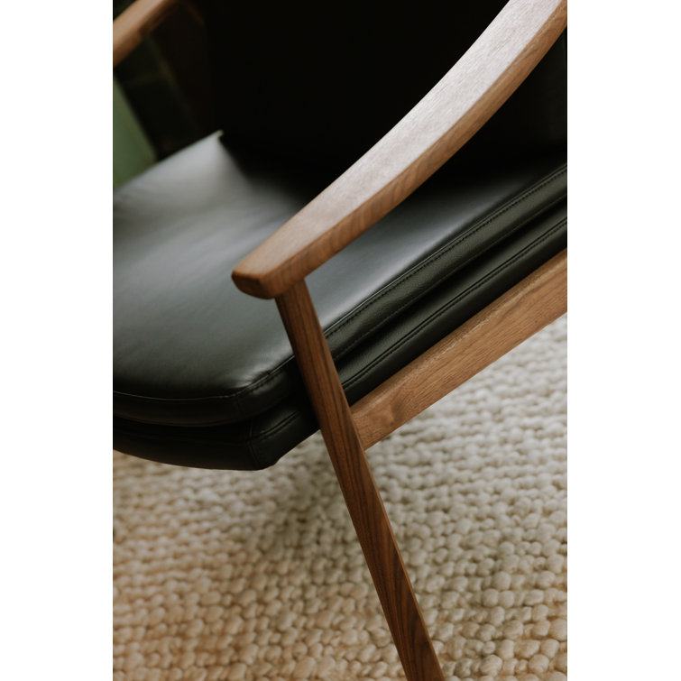 Pebbled Black Genuine Leather and Walnut Lounge Chair