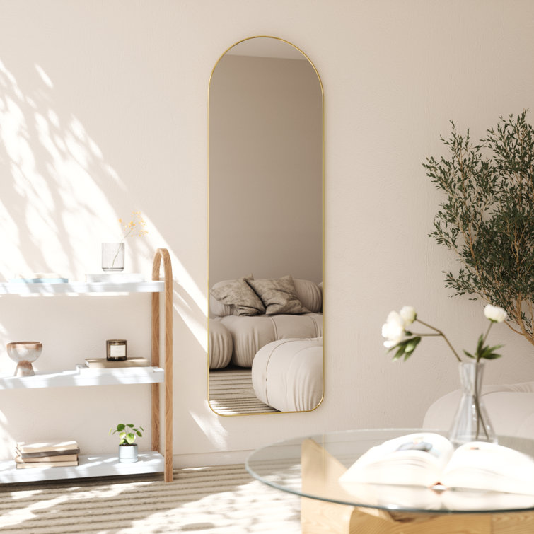 Elegant Arch Brass Leaning Floor Mirror with Sleek Metallic Rim