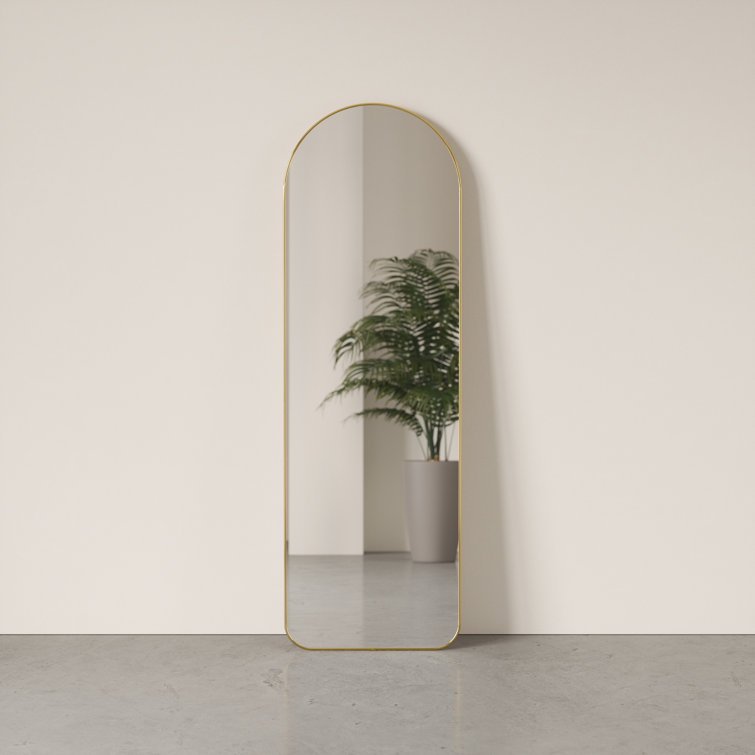 Elegant Arch Brass Leaning Floor Mirror with Sleek Metallic Rim