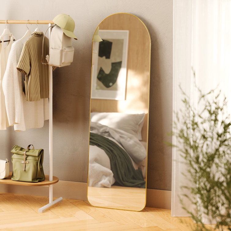 Elegant Arch Brass Leaning Floor Mirror with Sleek Metallic Rim