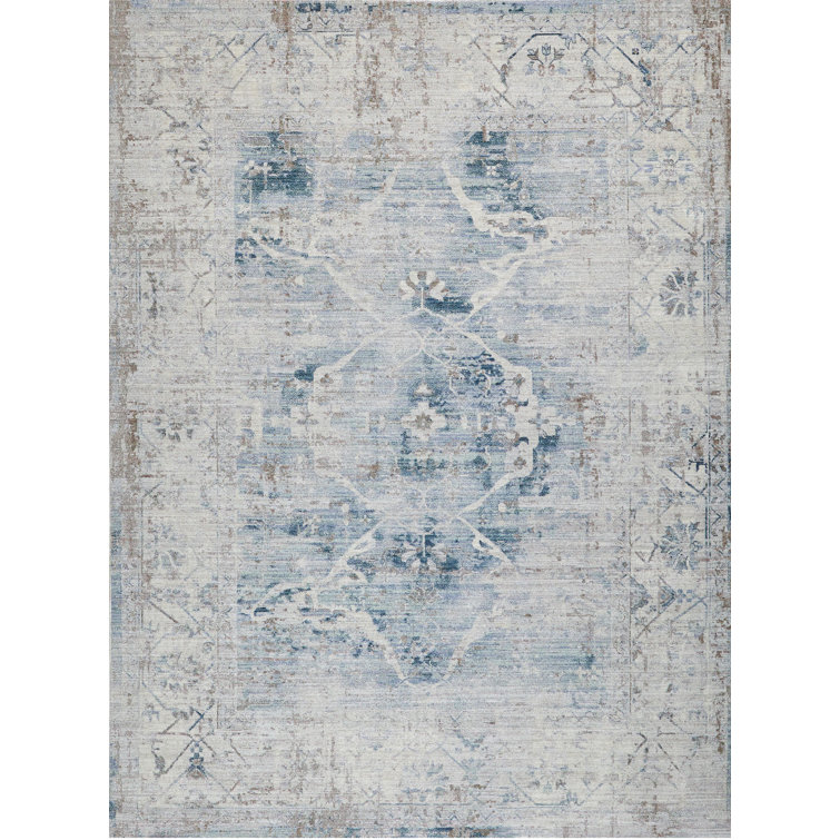 Vintage Inspired Light Blue and Beige 10' x 14' Synthetic Area Rug
