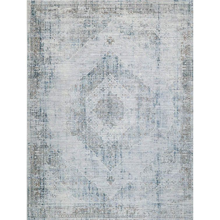 Vintage Blue and Beige 10' x 14' Synthetic Area Rug