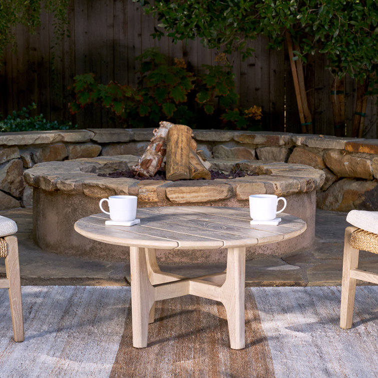 Gray Teak Wood Round Coffee Table with Sculpted Cross Base