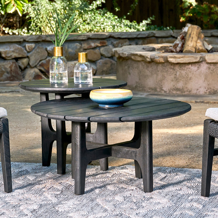 Gray Teak Wood Round Coffee Table with Sculpted Cross Base