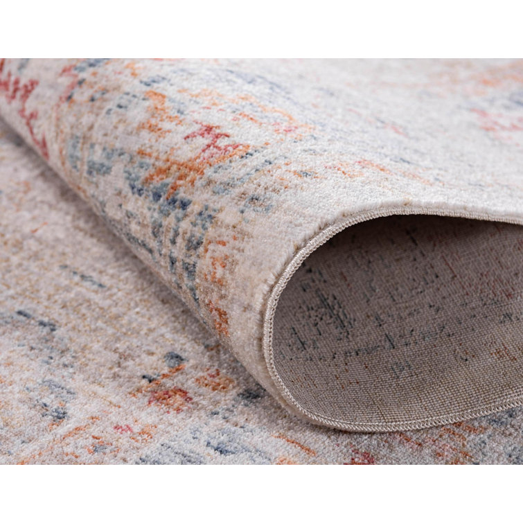 Ivory and Red Synthetic Rectangular 5' x 7' Area Rug