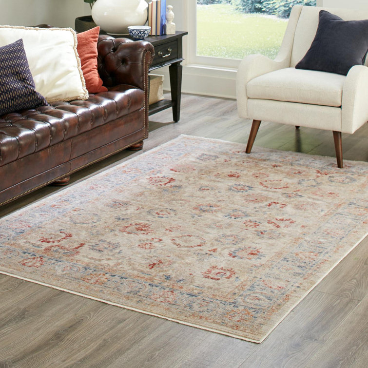 Ivory and Red Synthetic Rectangular 5' x 7' Area Rug