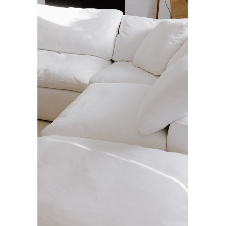 Terra Cream 114" Tufted Modular Sectional with Ottoman in Livesmart Fabric