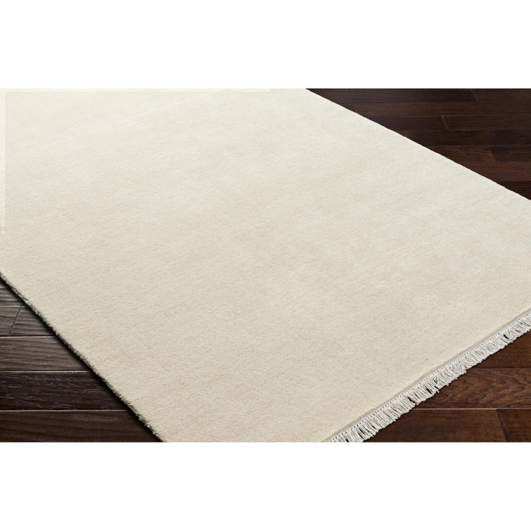 Handmade Beige Wool Fringed 6' x 9' Area Rug