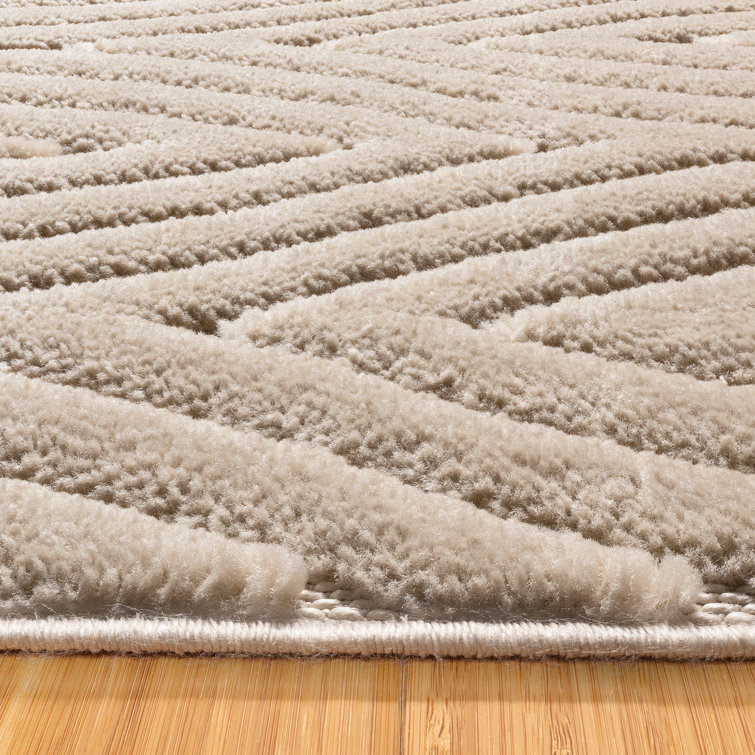 Beige Geometric Tufted Rectangular 6' x 9' Synthetic Rug