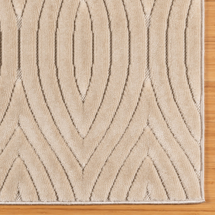 Beige Geometric Tufted Rectangular 6' x 9' Synthetic Rug