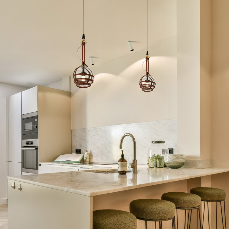 Bari Adjustable Height 7-inch Globe LED Pendant Light in Antique Brass