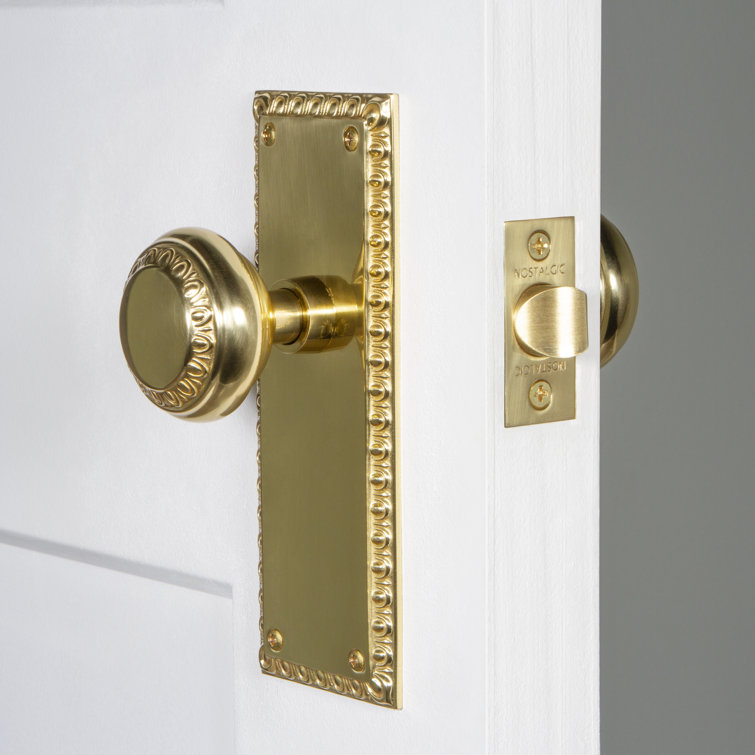 Unlacquered Brass Neoclassical Privacy Door Knob Set