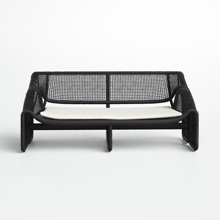 Curved Black Wicker Outdoor Sectional Sofa with White Cushions