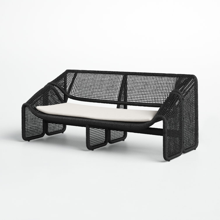 Curved Black Wicker Outdoor Sectional Sofa with White Cushions