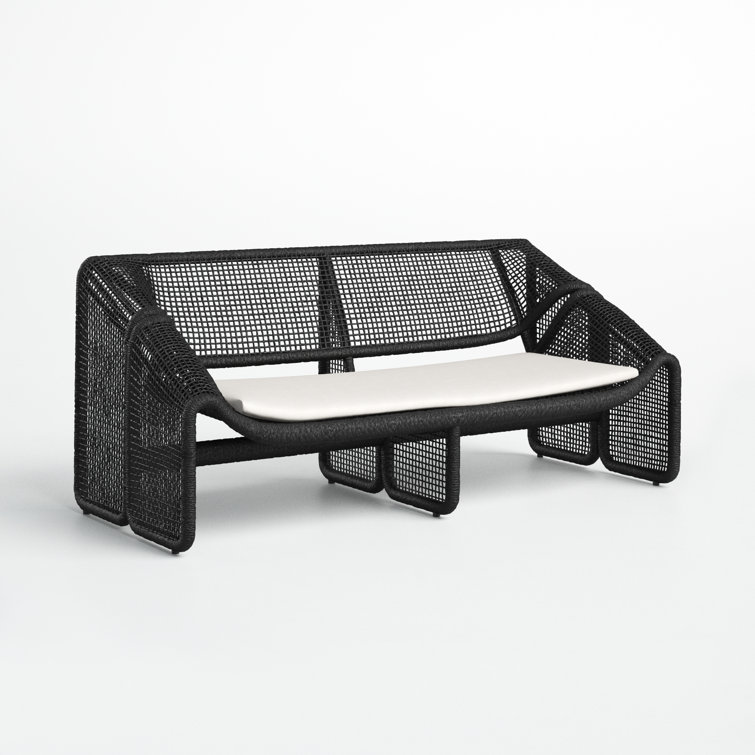 Curved Black Wicker Outdoor Sectional Sofa with White Cushions