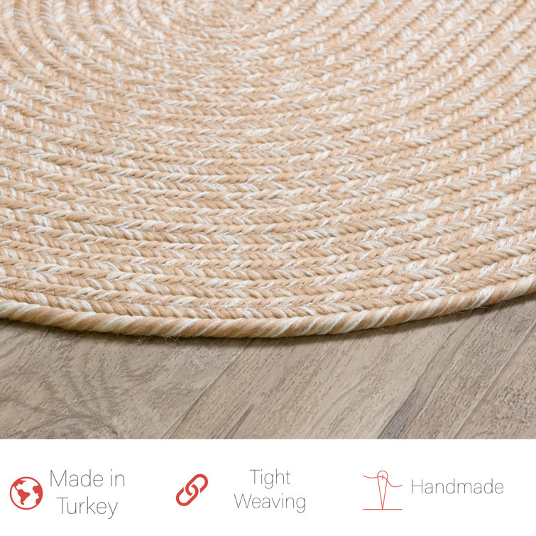Handmade Beige and Brown Oval Braided Polypropylene Area Rug