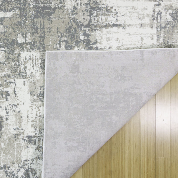 Omari Gray and Beige Synthetic 6' x 9' Abstract Area Rug