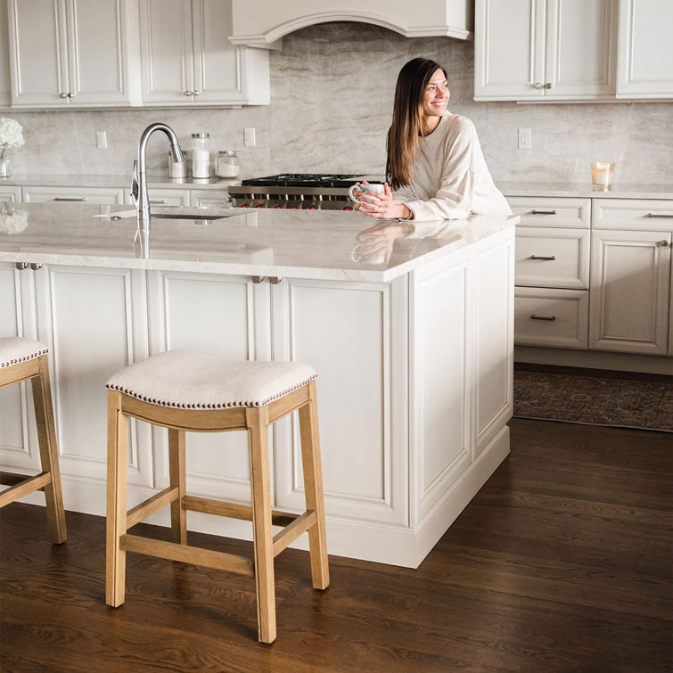 Adrien Brown Backless Saddle Wood Counter Stool